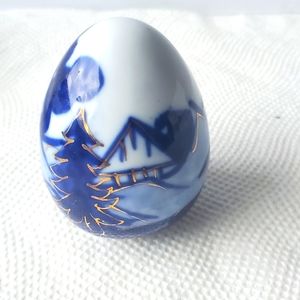 HAND PAINTED PORCELAIN EGG.